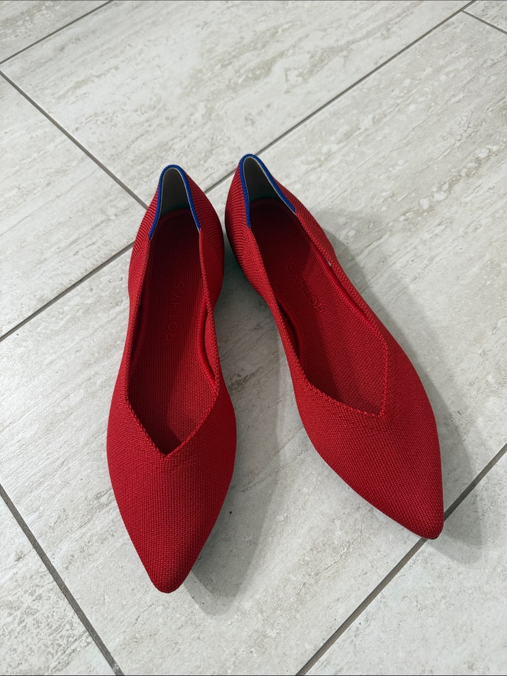 Rothy’s  Red Pointed Knit Slip-On Flats with Blue Trim.. new